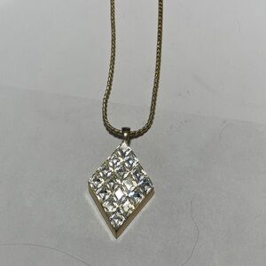 Elegant Gold and Silver Pendant Necklace